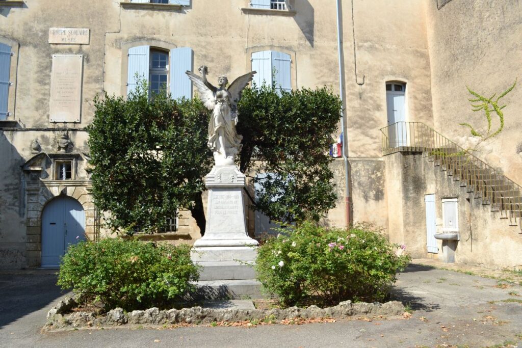 Angel statue in front of a private mansion in Lourmarin, France.